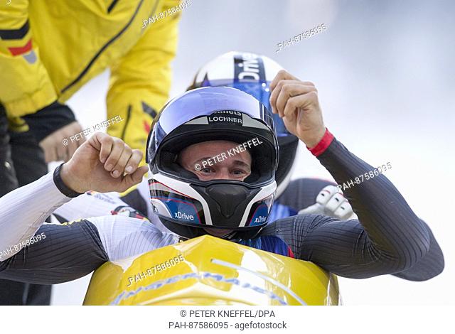German bobsledders Johannes Lochner and Joshua Bluhm come in first place at the men's doubles at the Bobsled World Cup in Schoenau am Koenigssee, Germany