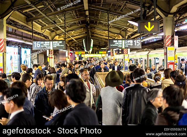 Crowd of people during rush hour on Tokyo metro