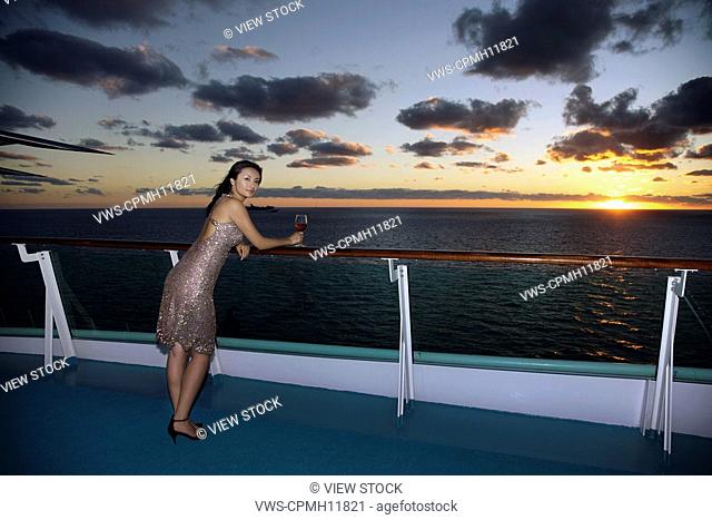 Chinese Woman In Evening Wear Relax On The Board