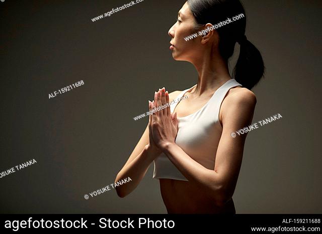 Japanese woman practicing yoga