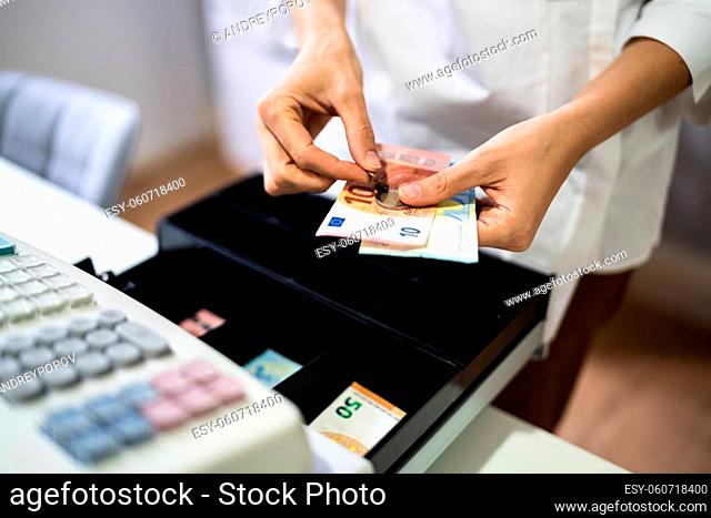 Cashier Hand Working With Cash Register Changing Money Bill