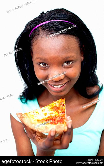 Smiling woman eating a pizza