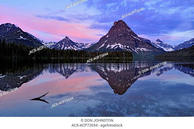 Sinapah Mountain reflected in Two Medicine Lake at dawn, Glacier National Park (Two Medicine sector), Montana, USA