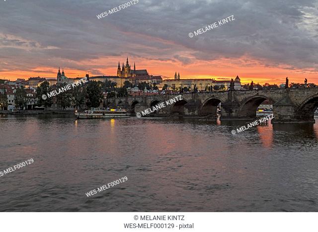 Czechia, Prague, Sunset over Prague Castle and Charles Bridge