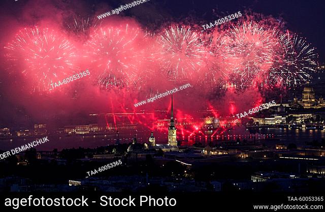 RUSSIA, ST PETERSBURG - JUNE 25, 2023: Fireworks go off over the Neva River during the Scarlet Sails festival, an annual celebration for secondary school...