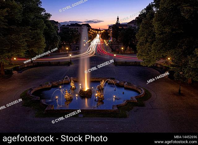 View of the fountain at the Friedensengel and Prinzregentenstraße at dusk. Munich, Bavaria, Germany