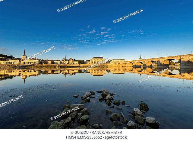 France, Maine et Loire, Loire valley listed as World Heritage by UNESCO, Saumur, Saint-Pierre church, the town hall and the theatre are reflected in the Loire...