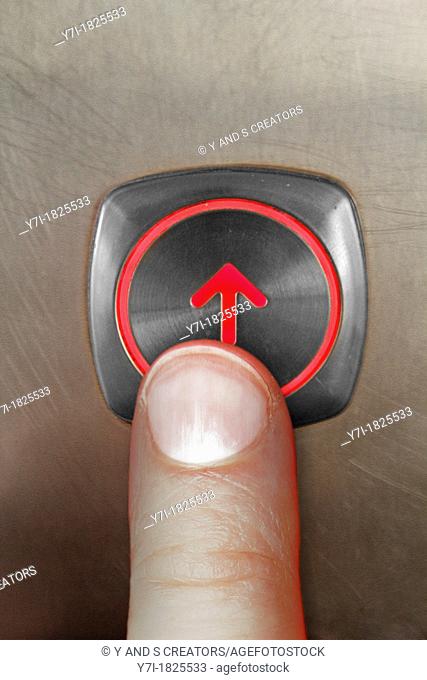 Button outside an elevator or lift