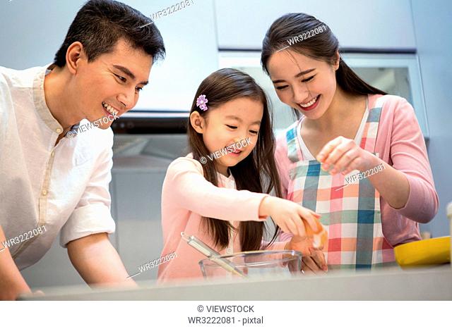 A happy family in the kitchen
