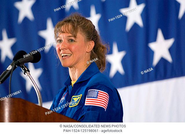 FILE: In this photo released by NASA, Astronaut Lisa M. Nowak, STS-121 mission specialist, speaks from a lectern in Ellington Field's Hangar 276 near Johnson...