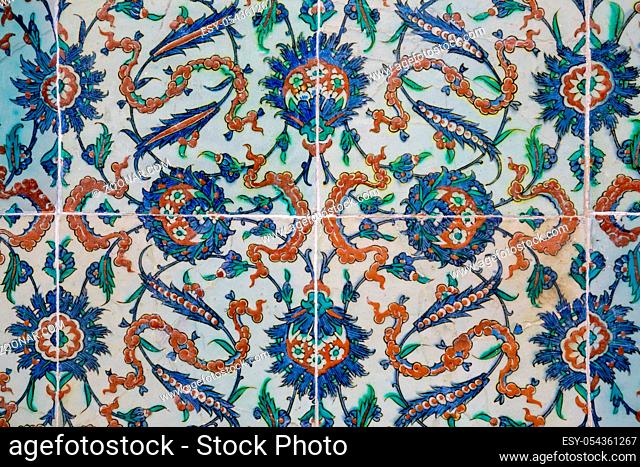 Texture of ceramic tiles in oriental East style. Turkish ceramic tiles lined on the wall. Old pattern floral ornament on tiles