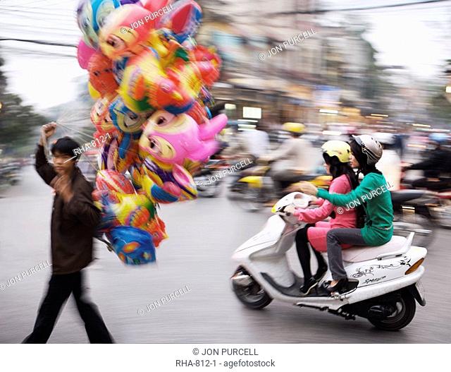 Man selling Balloons, Hanoi, Vietnam, Indochina, Southeast Asia, Asia
