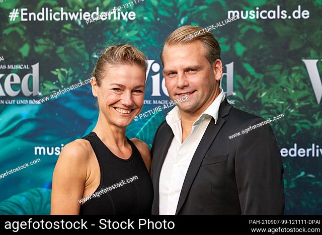 05 September 2021, Hamburg: Rhea Harder-Vennewald, actress, and her husband Jörg Vennewald arrive at the premiere of the musical ""Wicked at the Stage Theater...