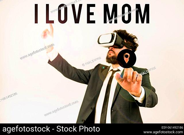 Conceptual display I Love Mom, Word Written on Good feelings about my mother Affection loving happiness Man Wearing Vr Glasses And Pointing On Important...