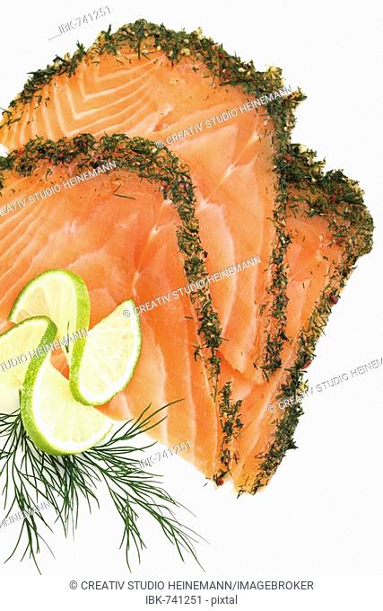 Graved salmon (gravlax) with dill, garnished with lime