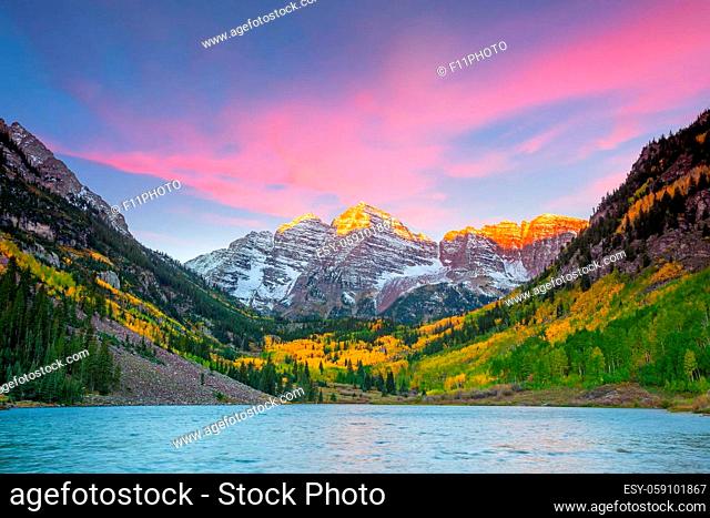 Landscape photo of Maroon bell in Aspen Colorado autumn season, United States at sunset