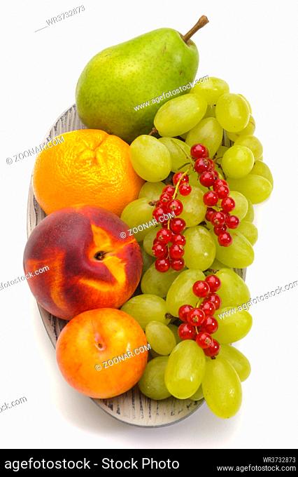 arrangement of fresh fruits from market and isolated over white background