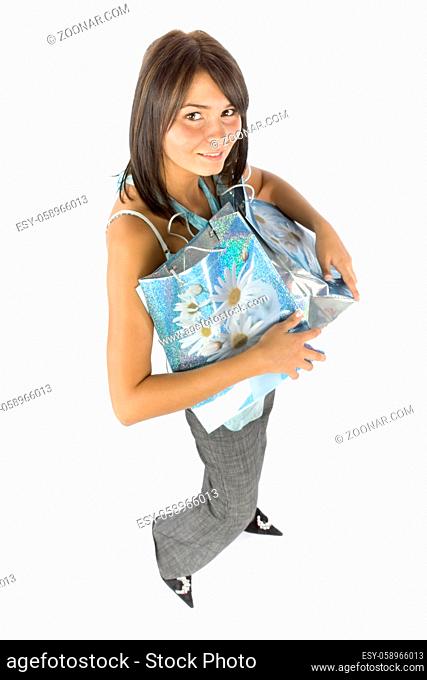 isolated woman - customer carrying paper bags