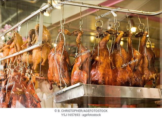 Roast duck hanging in a Chinese restaurant window