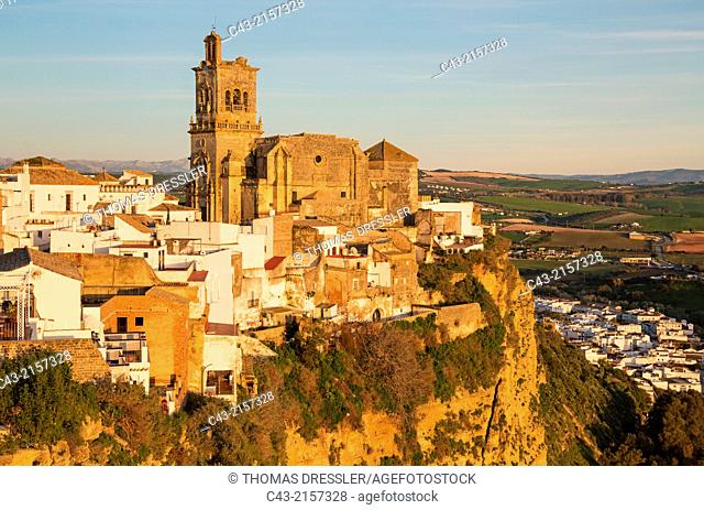 The historic district of the White Town of Arcos de la Frontera dramatically perches on a limestone crack high above the Guadalete river