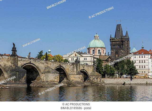 Buildings and bridge over Prague waterfront, Prague, Czech Republic