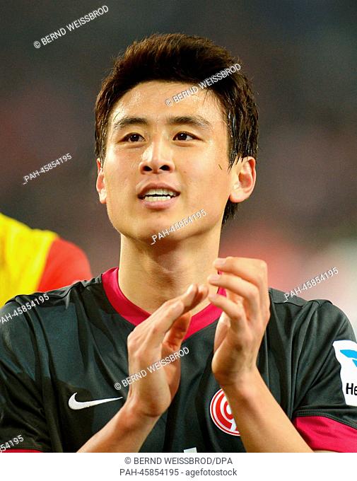 Mainz's new acquisition Ja-Cheol Koo celebrates his teams 1-2 away victory after the Bundesliga soccer match between VfB Stuttgart and 1