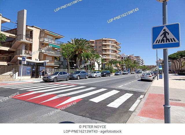 Spain, Catalonia, La Pineda. Pedestrian crossing to the promenade seafront at La Pineda