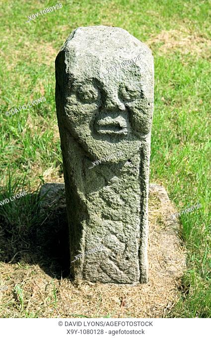 Carved early Celtic Irish Celtic Christian stone carving known as the Bishop's Stone in Killadeas churchyard near Enniskillen
