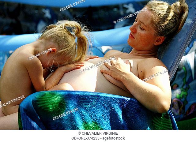 Nudist mother and daughter