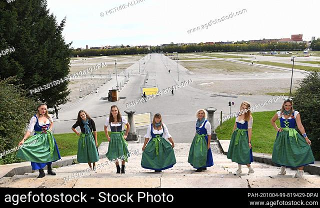04 October 2020, Bavaria, Munich: The waitresses of the Hofbräuzelt Nadine Lindenmeier, (l-r), Sabrina Schneider, Daniela Schneider, Milena Gebhardt