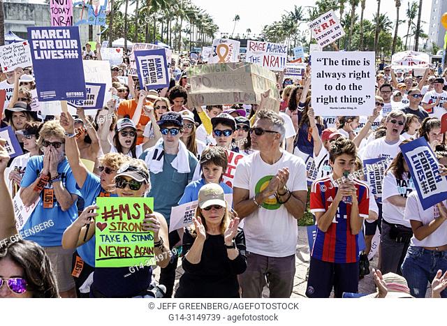 Florida, Miami Beach, Collins Park, March For Our Lives, public high school shootings gun violence protest, student, holding signs posters, teen, boy, girl