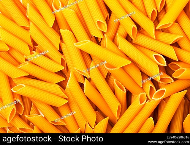 Penne pasta as background