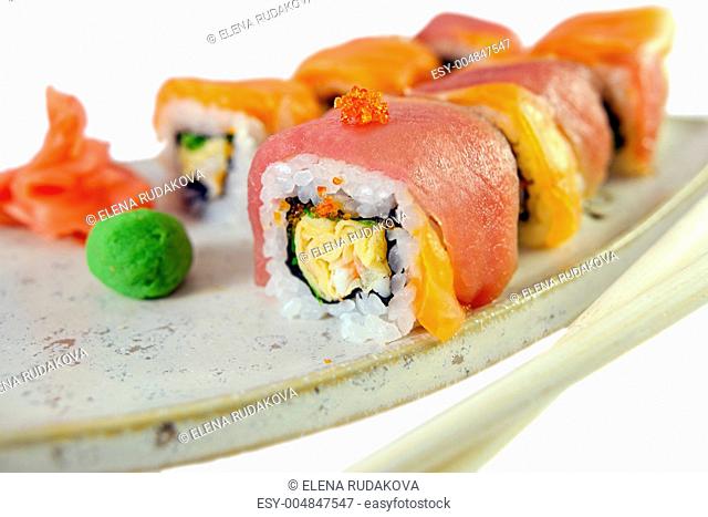 japanese rolls with salmon, tuna, omelette, tobiko and crab