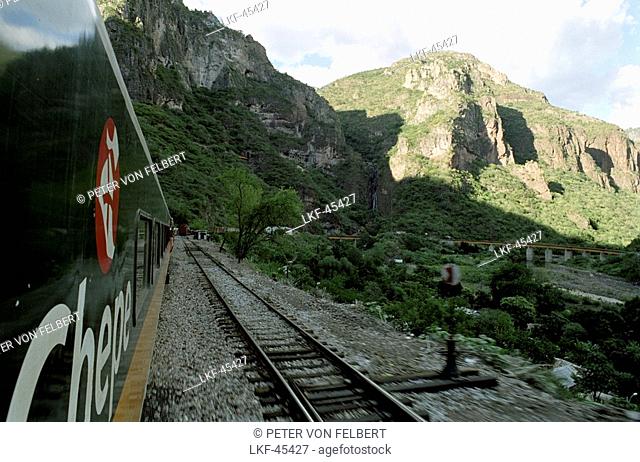 Train and tracks in the mountains, Ferrocarril Chihuahua al Pacifico, Chihuahua express, Mexico, America
