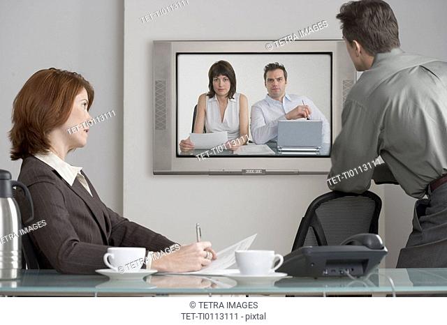 Businesspeople in videoconference