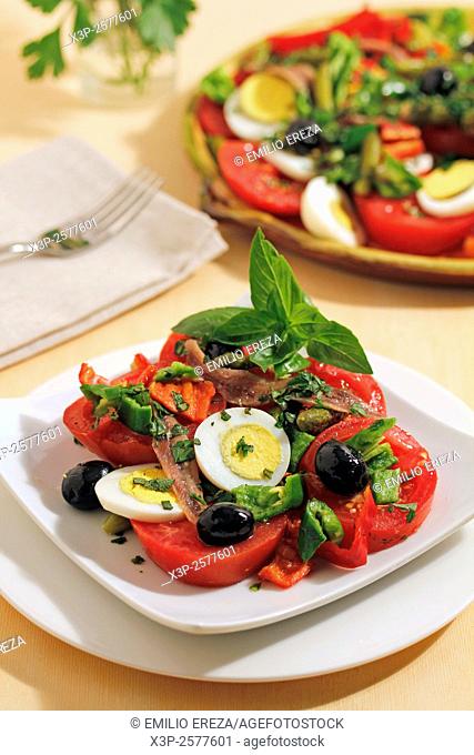 Anchovies and tomatoes salad