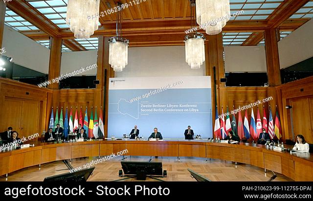 23 June 2021, Berlin: Heiko Maas (centre), Federal Foreign Minister, welcomes participants to the second Libya Conference in Berlin at the Federal Foreign...