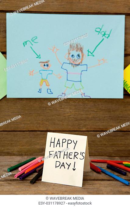 Paintings on drawing paper with happy fathers day message