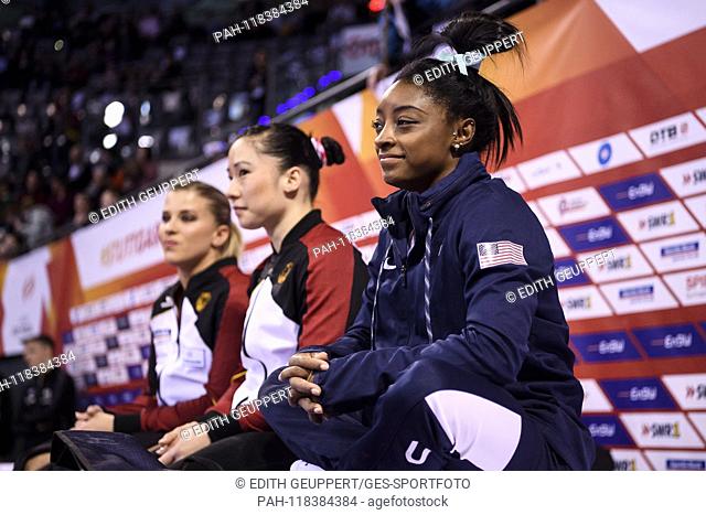 Simone Biles (USA), in the background Kim Bui (GER) and Elisabeth Seitz (GER) (from right). GES / Gymnastics / EnBW DTB Pokal, World Cup Ladies, 17.03