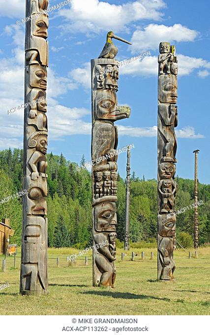 Kitwanga Totem Poles. Gitwangak or Gitwangax. Gitanyow. Gitksan people. Northwest Coast First Nations. Nass Range of mountains , Kitwanga, British Columbia