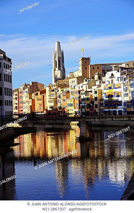 The Onyar River. In the background the tower of Sant Feliu or San Felix Church stands out. City of Girona, Catalonia, Spain, Europe