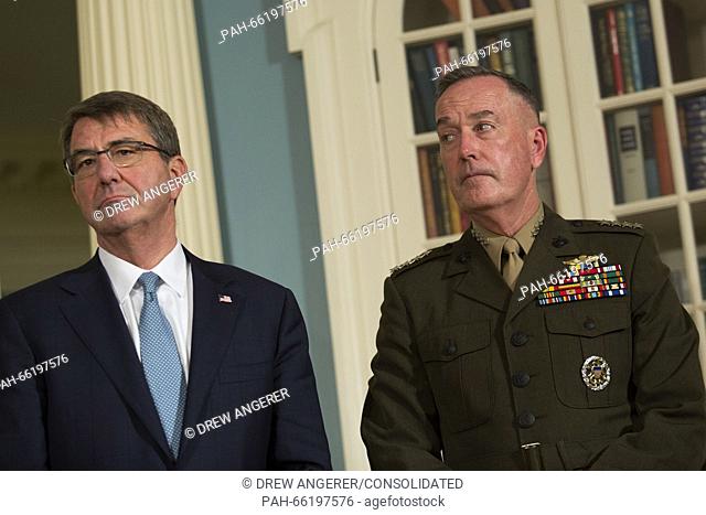 United States Secretary of Defense Ashton Carter, left, and Chairman of the Joint Chiefs of Staff General Joseph Dunford look on as US President Barack Obama as...