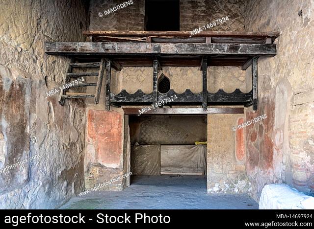 Herculaneum, Italy, Ancient two-storeyed shop with remains of an old wooden staircase, Herculaneum, Italy