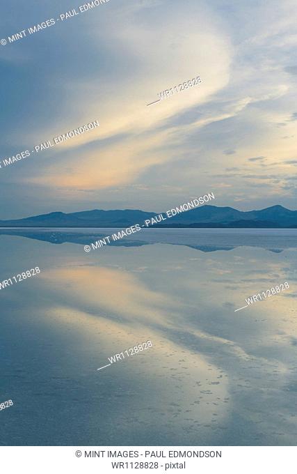 Shallow water over the surface at the Bonneville Salt Flats near Wendover, at dusk