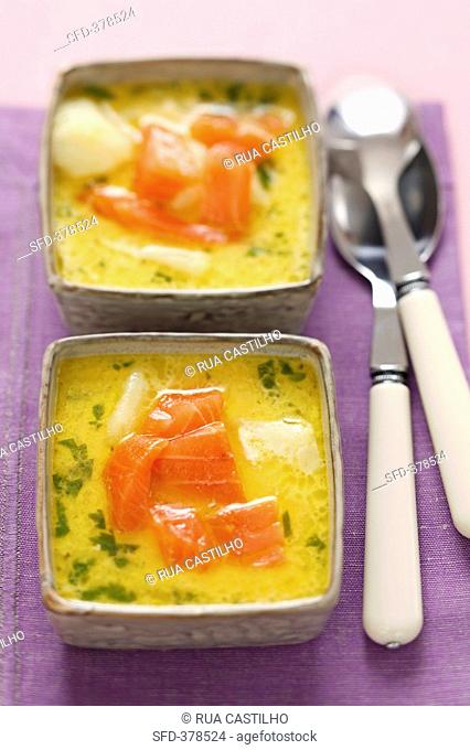 Potato soup with smoked salmon and parsley