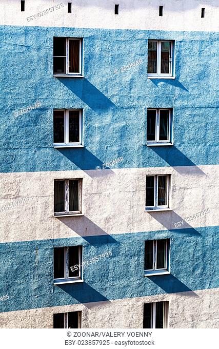 apartment building wall with windows