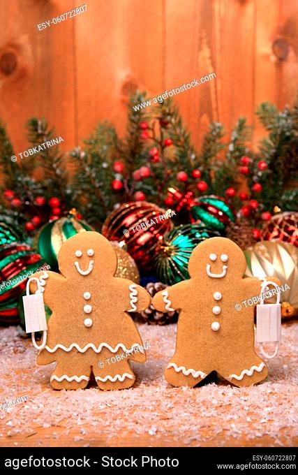 Gingerbread FamilyWith Covid Masks on Holiday Christmas Background