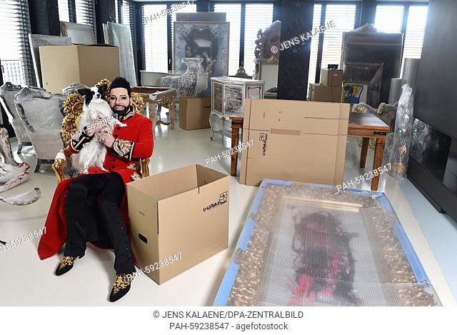 EXKLUSIVE- Star designer Harald Glööckler with his Papillon Billy King in his luxury penthouse apartment among packed boxes and wrapped furnitures and art...