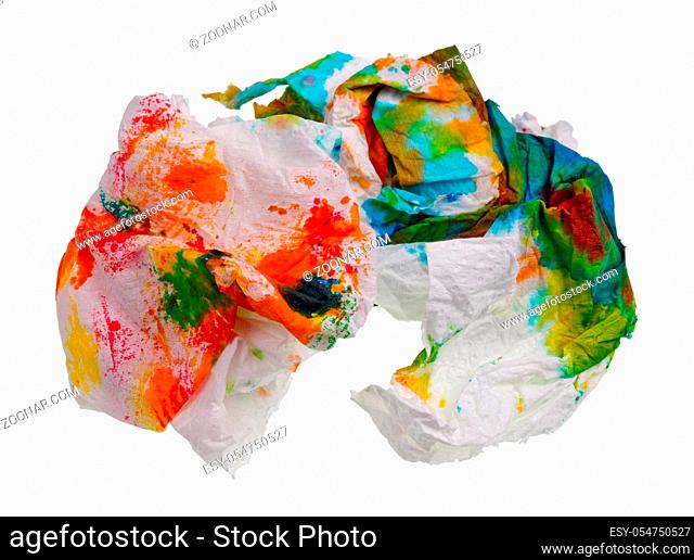 Crumpled paper broken napkin wiped paint from Easter egg. Isolated on white ctudio macro