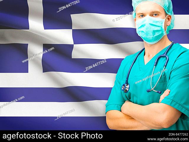 Surgeon with national flag on background - Greece